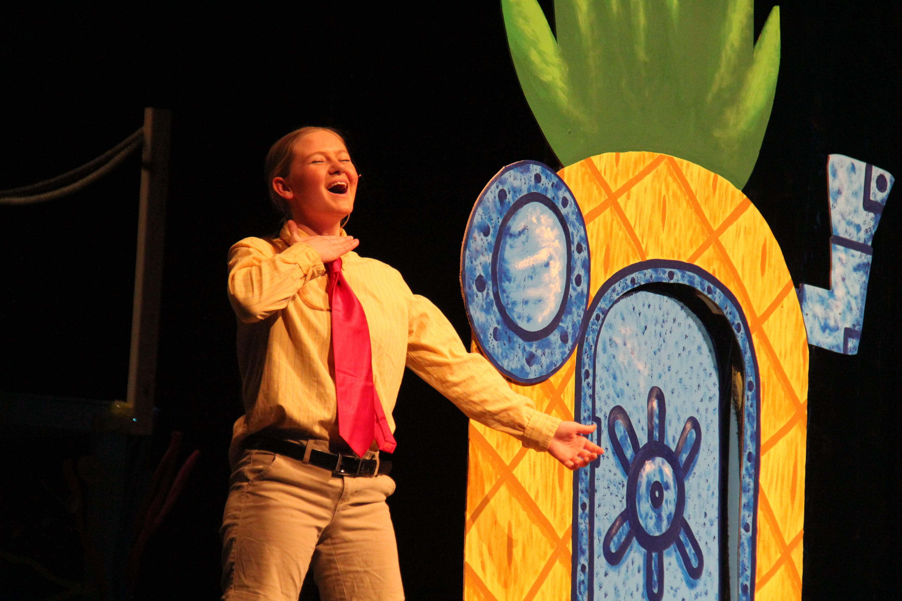 Alexa Nelson, as SpongeBob, performs a scene from “The SpongeBob Musical.”